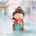 Cartoon Tang Dynasty lady resin figurine playing sheng instrument with floral headpiece - 1056-15F Playing Sheng