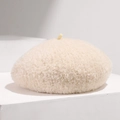 Close-up of oatmeal wool beret with soft fluffy texture and classic top detail - Adjustable / Off-white