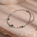 Dettaglio ravvicinato del bracciale tennis con zirconi verde smeraldo su pietra - Stile Tennis con Zircone Argento (11#)