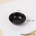 Miniature black matte dollhouse plate with 5.2cm diameter and minimalist ceramic texture - 5cm Flat Bottom Black Bowl
