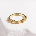 Close-up of gold adjustable ring featuring cross star patterns and zircon inlays - Micro-pave Cross Star Style / Gold