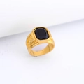 Men's vintage golden signet ring featuring a rectangular black stone with relief patterns - Gold & Black