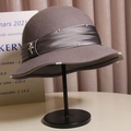 Close-up of grey wool cloche hat with satin ribbon, pearl accents and vintage metal buckle - M (56-58cm) Adjustable / Gray