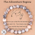 Pink zebra jasper beaded bracelet with silver compass charm on graduation card - Pink Zebra Compass