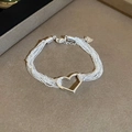 Vue macro détaillée d'un bracelet en argent multi-rangs avec un pendentif cœur creux en zircon - Style Cœur Multi-rangs (3#) / Argenté