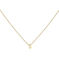 Detailed close-up of 18K gold letter S initial pendant necklace with polished finish - Gold S