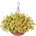 Close-up of yellow artificial flowers in a metal hanging basket with coconut fiber liner - Yellow