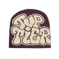 Detailed knit texture of dark purple beanie featuring beige TOP TIER jacquard lettering - Coffee