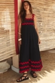 Detail of black maxi dress featuring red scalloped trim and premium cotton-linen texture - S / Black With Red Scalloped Trim