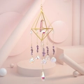 Detail of golden geometric crystal suncatcher with purple natural stone and prisms - Amethyst