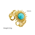 Detail view of gold sunflower ring with 15mm turquoise stone and braided band details - Turquoise Blue