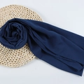 Dark blue chiffon hijab scarf with subtle texture on a rustic woven mat background - 98