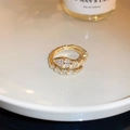Macro shot of gold snake-shaped ring with square-cut zirconia on white ceramic - Gold Snake Wrap Open Ring (21#)