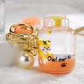 Cute cartoon tiger gas tank keychain with orange quicksand liquid and large pearl - Orange Gas Tank