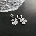 Detailed view of silver clover drop earrings with white shell inlay and zircon accents - Four Leaf Clover Earrings (535#XK) / Silver