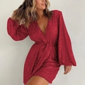 Detail of red sequined dress showing deep V-neck, long puff sleeves, and waist tie texture - S / Top And Bottom / Red