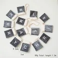 Christmas garland with grey sequin pockets and white trim spelling Merry Christmas, 1.3m long - Sequined Mini Stocking Pull Flag / Gray