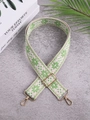 Close-up of bohemian green floral jacquard bag strap with gold metal lobster clasps - Green
