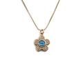 Collier fleur dorée avec smiley en émail bleu et pétales en zircon sur chaîne box - Bleu
