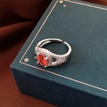 Silver open ring with orange oval gemstone and side diamonds on a navy jewelry box - Silver Base Orange Oval Double Layer Style