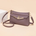 Dusty purple quilted crossbody bag with gold swan buckle and pearl accent for women - Purple