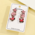 Close-up of wooden marine earrings set featuring starfish shell and crab designs - Sea Star Shell Crab Set (N-340)