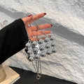Detail of silver spherical chain box bag with polished metallic texture for women - Snake Chain / Mini Silver
