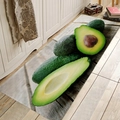Absorbent flannel floor runner featuring a realistic avocado print on a wooden floor - 40x60cm / Realistic Avocado