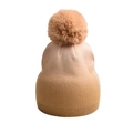 Detail of knit beanie featuring a fluffy faux fur pompom and gradient ribbed texture - Tie-Dye Pom-Pom Knit Hat / Ginger Yellow