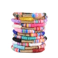 Detailed close-up of stacked colorful clay bead friendship bracelets with gold metal accents - 12-Piece Set C