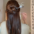 Wooden hair stick with white bird motif and long pearl tassels in a half-up hairstyle - 13# Hair Stick - White Bird Tassel