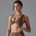 Detail of deep brown sports bra showing front twist knot and high elasticity fabric - Chestnut Brown