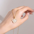 Elegant gold necklace featuring a white camellia flower pendant with central pearl detail - Gold White Enamel Camellia