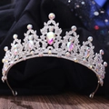 Detailed macro view of silver bridal crown featuring colorful rhinestones and teardrop crystal - Silver White Diamond + AB Diamond
