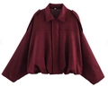 Detailed close-up of wine red bomber jacket featuring soft suede texture and cuffed hem - S / Burgundy