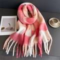 Thick rainbow plaid scarf with long tassels made of soft knit fabric on a gray table - Pink Orange White Large Plaid (WJ137-32)