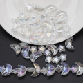 Detailed view of iridescent moon and star glass beads for DIY jewelry making sets - AB White