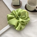 Elegant light green satin oversized scrunchie with smooth glossy silk texture - Green