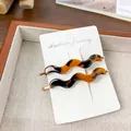 Pair of wave-shaped tortoise shell acetate hair clips with elegant gold metal fasteners - 2 Pieces/Pack (6.8cm) / Coffee Tortoise Shell