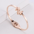 Bracciale a farfalla minimalista in acciaio al titanio oro rosa con design a molla - Oro rosa