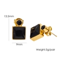 Macro detail of gold-plated square earrings with black zircon and dimensions - Black