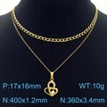 Gold layered necklace with hollow heart pendant and Cuban chain detail on black display - Hollow Double Heart Style (KN250356-SY)