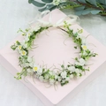 Floral bridal headpiece with white daisies and eucalyptus leaves on a pink gift box - Pure White Combo