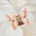 Detailed top view of a pink butterfly hair claw clip with colorful marble resin patterns - Elegant Pink (Approx 7cm)