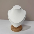 Detail of white PU leather necklace bust with solid round wood base for jewelry display - Brushed Leather / Small / White
