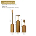 Tres candelabros minimalistas dorados en metal cepillado con diferentes alturas - Set de tres piezas / Oro Cepillado