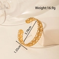 Gold hollow floral cuff bracelet with intricate five-petal pattern in stainless steel - Floral Hollow Structure