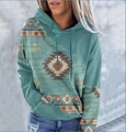 Detail of turquoise oversized hoodie featuring vintage tribal geometric patterns and drawstring - S / Turquoise Tribal