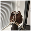 Detail of brown corduroy bucket bag featuring red strawberry prints and white cotton drawstrings - Coffee Strawberry