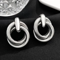 Modern intertwined geometric hoop earrings in polished and hammered silver finish - Double Loop Intertwined Textured Silver (11429)